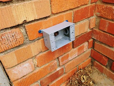 cutting electrical box in brick|exterior outlet for brick house.